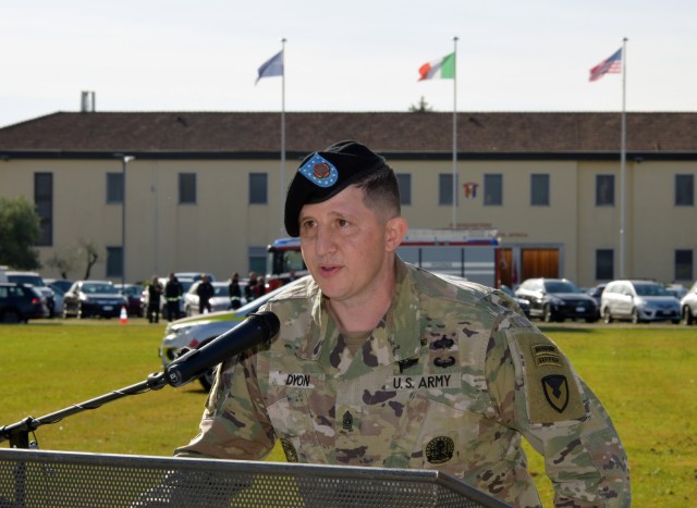 U.S. Army Command Sgt. Maj. Jonathan D. Dyon, incoming command Sgt. Maj. of U.S. Army Garrison Italy, gives a speech during change of responsibility ceremony under Covid-19 prevention condition at Caserma Ederle, Vicenza, Italy Nov. 10, 2021....