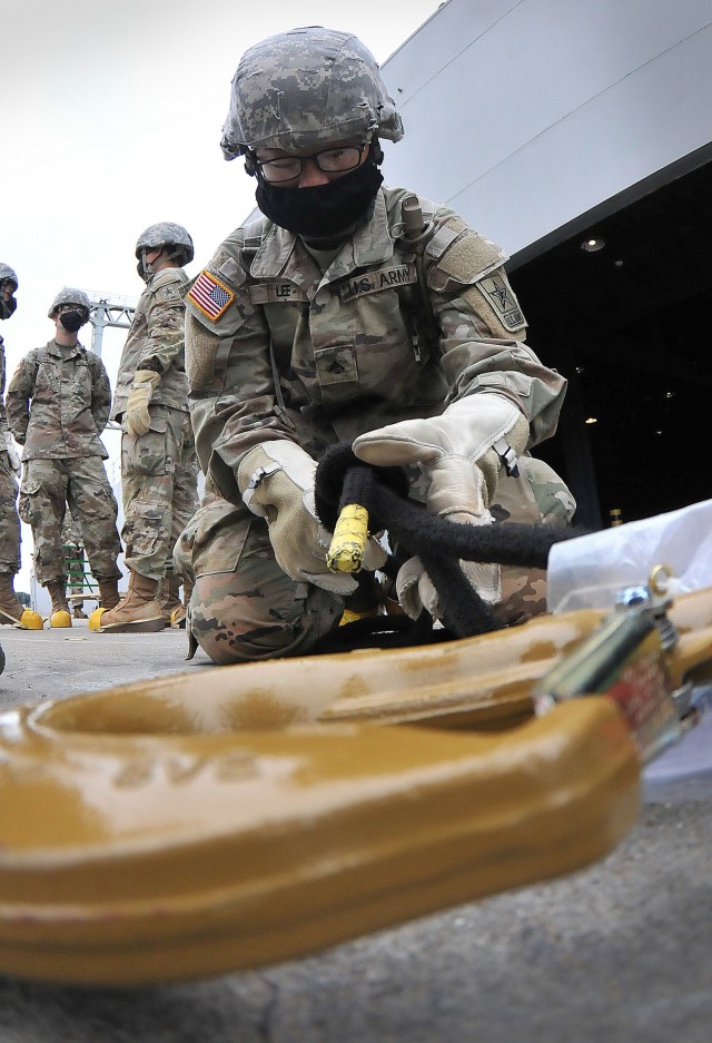 Pvt. Hyejun Lee secures a bowline to a hook during 88H Cargo Specialist Course training Oct. 28 at 3rd Port, Joint Base Langley-Eustis, Va. The course is an offering of the Army Transportation School’s Maritime and Intermodal Training...