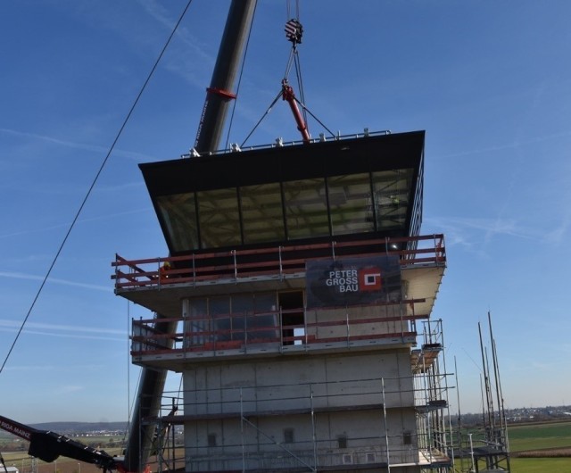 The top of the new air traffic control tower, the cap, was lifted by crane to the new structure on Nov. 9 at the Wiesbaden Army Airfield.