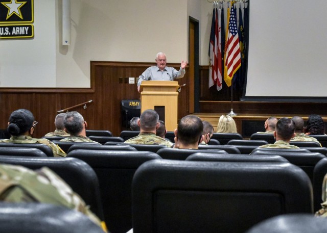 Retired Sgt. Maj. Dennis Wolfe – who helped pioneer the Explosive Ordnance Disposal role in Army Special Operations Command missions, where foreign nuclear weapons may be present – speaks to Fort Leonard Wood leaders during a professional development event Nov. 10 in Lincoln Hall Auditorium.