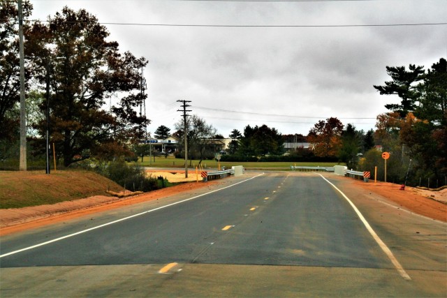 The area of construction operations is shown at a bridge area on South J Street on Oct. 29, 2021, where a new bridge was built on the street at Fort McCoy, Wis. The new bridge was built over Tarr Creek on the installation’s cantonment area. Fort...