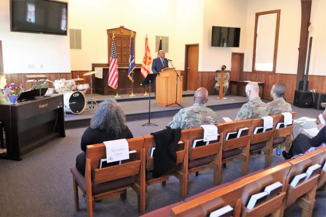 Retired Wisconsin State Patrol Maj. Darren Price gives his presentation Nov. 4, 2021, as the guest speaker for the 2021 Veterans Day Prayer Luncheon at Fort McCoy, Wis. Price, a military veteran, is now a pastor with the Tomah (Wis.) Pentecostal...