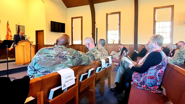 Retired Wisconsin State Patrol Maj. Darren Price gives his presentation Nov. 4, 2021, as the guest speaker for the 2021 Veterans Day Prayer Luncheon at Fort McCoy, Wis. Price, a military veteran, is now a pastor with the Tomah (Wis.) Pentecostal...
