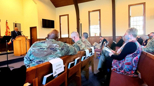 Retired Wisconsin State Patrol Maj. Darren Price gives his presentation Nov. 4, 2021, as the guest speaker for the 2021 Veterans Day Prayer Luncheon at Fort McCoy, Wis. Price, a military veteran, is now a pastor with the Tomah (Wis.) Pentecostal...