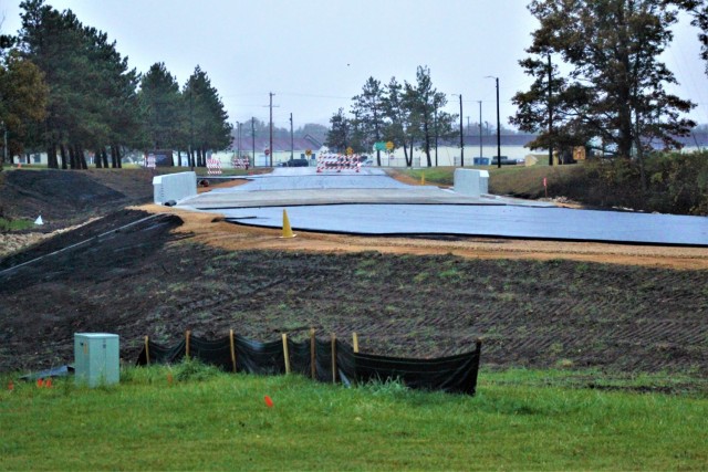 The area of construction operations is shown at a bridge area on South J Street on Oct. 21, 2021, where a new bridge was built on the street at Fort McCoy, Wis. The new bridge was built over Tarr Creek on the installation’s cantonment area. Fort...