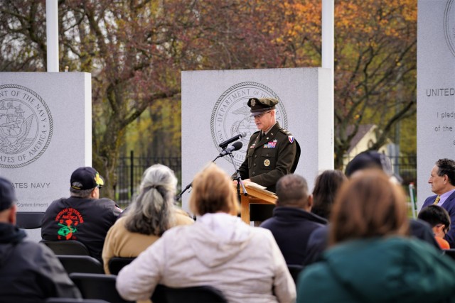             Col. Steven Carozza, chief of staff for the U.S. Army Tank-automotive and Armaments Command, addresses a crowd gathered to honor the service of Veterans in Clinton Township Nov. 11.                    