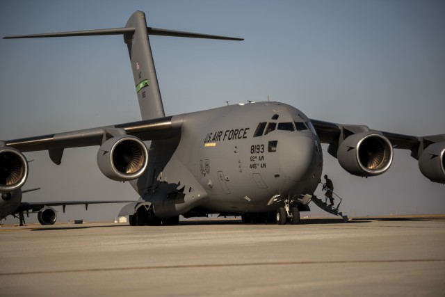 A U.S. Air Force C-17 Globemaster III from McChord Air Force Base, Washington, prepares for takeoff Aug. 25, 2021, on the flight line at Travis AFB, California. The McChord C-17 stopped while en route to an undisclosed location in support of Operation Allies Refuge to pick up Airmen and equipment from the 860th and 660th AMXS. The two maintenance squadrons maintain the C-17 and KC-10 Extender, respectively. The U.S. Air Force, in support of the Department of Defense, moved forces into theater to facilitate the safe departure and relocation of U.S. citizens, Special Immigration Visa recipients, and vulnerable Afghan populations from Afghanistan. (U.S Air Force photo by Nicholas Pilch)