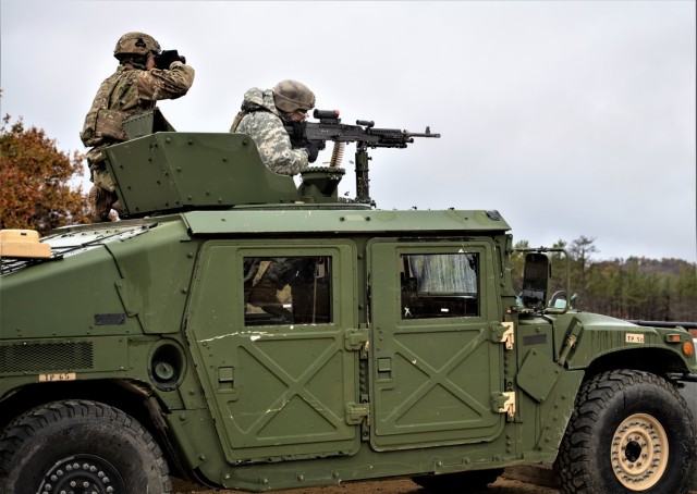 A Soldier with the 2nd Squadron, 106th Cavalry (2-106) of the Illinois National Guard fires a machine gun at a target Oct. 21, 2021, at a live-fire range at Fort McCoy, Wis. During their training on post in October, 2-106 Soldiers completed...