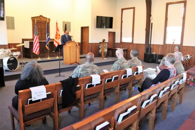 Retired Wisconsin State Patrol Maj. Darren Price gives his presentation Nov. 4, 2021, as the guest speaker for the 2021 Veterans Day Prayer Luncheon at Fort McCoy, Wis. Price, a military veteran, is now a pastor with the Tomah (Wis.) Pentecostal...