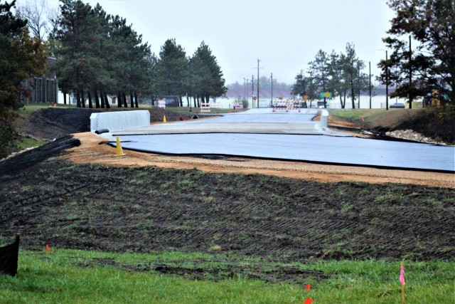 The area of construction operations is shown at a bridge area on South J Street on Oct. 21, 2021, where a new bridge was built on the street at Fort McCoy, Wis. The new bridge was built over Tarr Creek on the installation’s cantonment area. Fort...