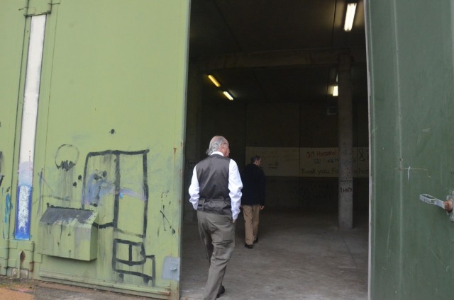 Larry Strickland, garrison safety office chief, and Curt Hoyer, garrison safety officer, conduct a safety walk-through of living support area four to check on the clean-up efforts on Rhine Ordnance Barracks for the conclusion of Operation Allies Welcome.