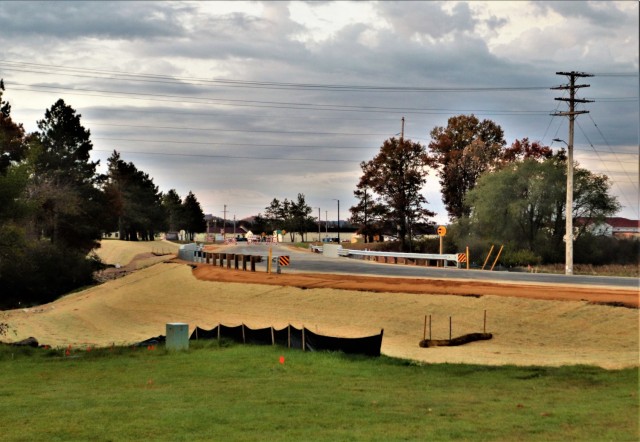 The area of construction operations is shown at a bridge area on South J Street on Oct. 27, 2021, where a new bridge was built on the street at Fort McCoy, Wis. The new bridge was built over Tarr Creek on the installation’s cantonment area. Fort...