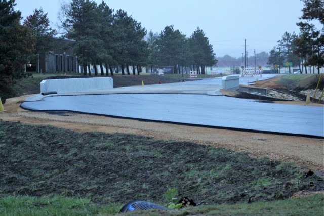 The area of construction operations is shown at a bridge area on South J Street on Oct. 21, 2021, where a new bridge was built on the street at Fort McCoy, Wis. The new bridge was built over Tarr Creek on the installation’s cantonment area. Fort...