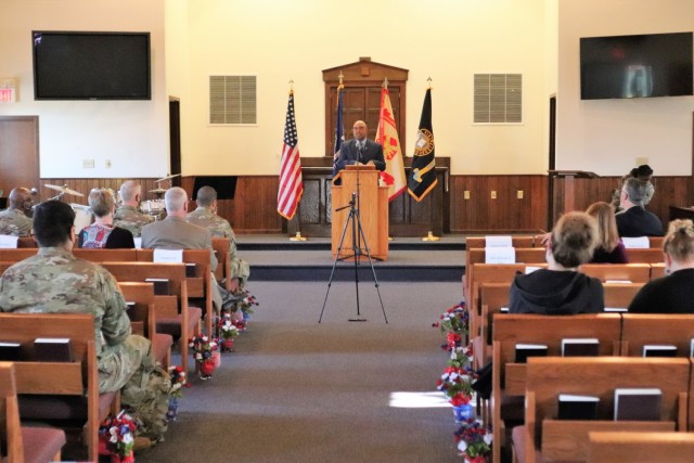 Retired Wisconsin State Patrol Maj. Darren Price gives his presentation Nov. 4, 2021, as the guest speaker for the 2021 Veterans Day Prayer Luncheon at Fort McCoy, Wis. Price, a military veteran, is now a pastor with the Tomah (Wis.) Pentecostal...