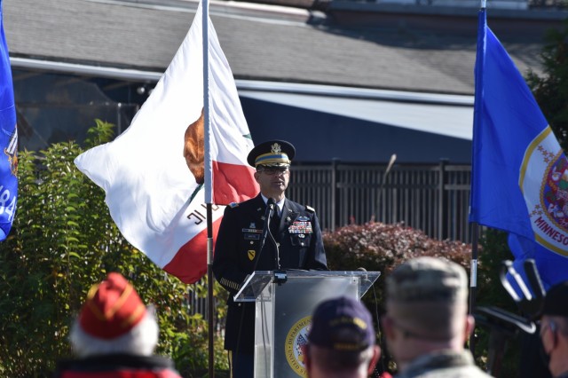 Col. Craig Martin, Fort Hamilton Garrison Commander, provides opening remarks during the Veterans Day ceremony held outside the Community Club on Fort Hamilton, N.Y., Nov. 10, 2021. The ceremony celebrated the legacy and accomplishments of those who answered the call to service.