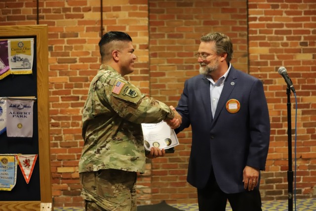 SFC Javier Perez Cosme is formally recognized during the Columbus Rotary Club MoH COL (RET) Ralph Puckett Soldier of the Week program. Perez has served the Nation for 22 years in a multitude of leadership positions. US Army Photo by SGT Vladimir Varlack