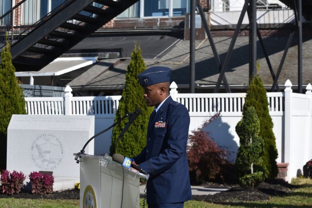 U.S. Air Force Capt. Kevin Molligan, 24th Civil Support Team operations officer, shares his story as one of the guest speakers during the Veterans Day ceremony held outside the Community Club on Fort Hamilton, N.Y., Nov 10, 2021.  This year’s emphasis was on the 20th anniversary of the Global War on Terrorism.  Members from each branch of the military reflected on their personal service and their military branch’s role supporting GWOT operations.