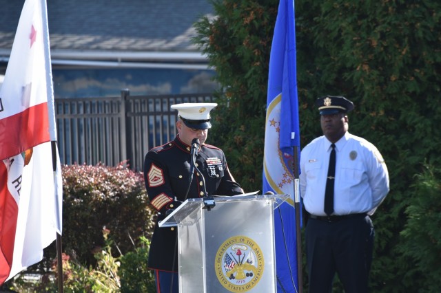 U.S. Marine Corps Gunnery Sgt. Bruce Miller, 6th Communication Battalion operations chief, shares his story as one of the guest speakers during the Veterans Day ceremony held outside the Community Club on Fort Hamilton, N.Y., Nov 10, 2021.  This...