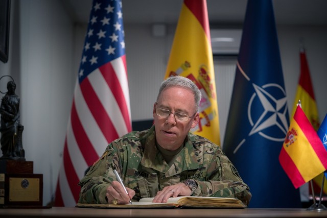 Maj. Gen. Greg Brady, commander of the 10th Army Air and Missile Defense Command, signs the guest book for Spanish NATO Allies at Incirlik Air Base, Turkey, during a site visit on Nov. 3, 2021. (U.S. Army photo by Maj. Robert Fellingham)