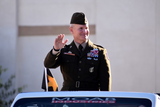 Brig. Gen. John Cushing, deputy commanding general of U.S. Army Recruiting Command, waves to the crowd during the 11th Annual Veterans Day Parade in Salinas, Calif., Nov. 11. Cushing was the parade’s grand marshal.