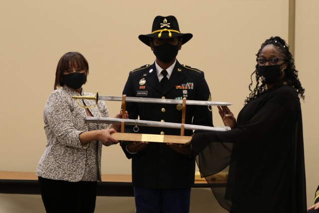 Staff Sgt. Roderick Armstrong, Brigade Paralegal NCO, 1st Cavalry Division Sustainment Brigade, was awarded the Sgt. Eric L. Coggins Award for Excellence by The Judge Advocate General of the United States Army, Lt. Gen. Stuart Risch, Nov. 15, in a ceremony at Fort Hood’s Mission Training Complex.