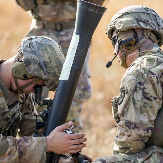Old Guard Soldiers participate in a mortar live-fire exercise