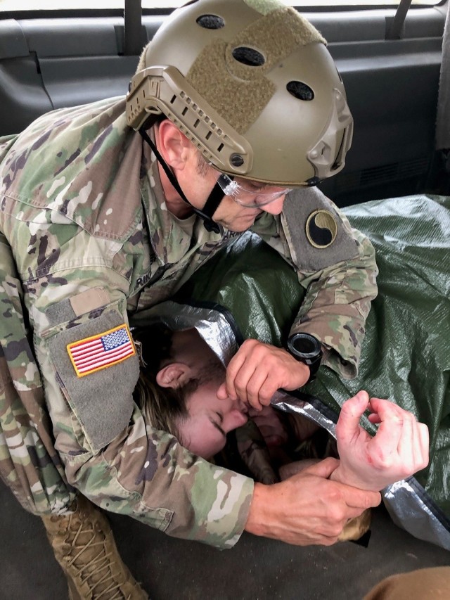 A FACT participant rehearses tactical medical care during the course’s culminating exercise Nov. 5 at Fort Bragg, N.C. This event combines all the learning objectives and training received throughout the course, testing students’ reactions to emergency situations and potential threats. 