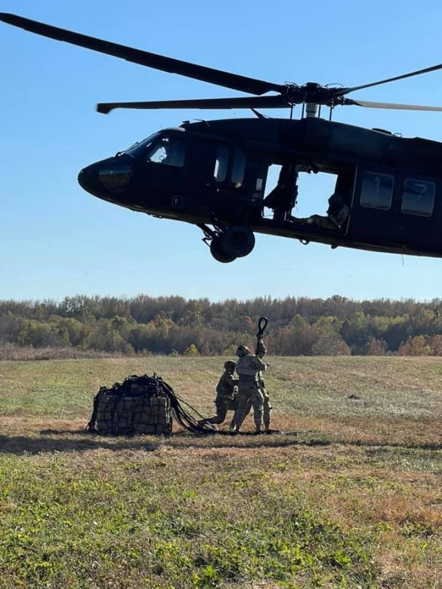 Soldiers from Alpha Company, 526th Brigade Support Battalion, 2nd Brigade Combat Team, 101st Airborne Division (Air Assault), prepare to sling load resupplies to their sister units during the Division Training Density at Fort Campbell Ky.,...