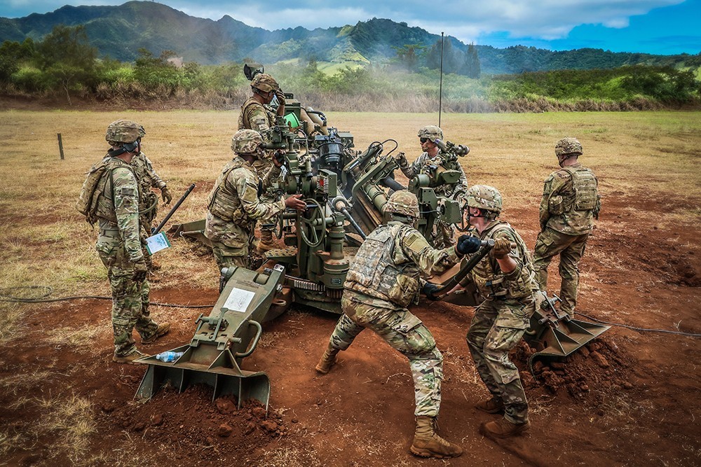 Schofield Barracks, HI —  Soldiers from 1st Platoon, Charlie Battery “Copperheads”, 3-7 Field Artillery, 25th Infantry Division Artillery conducted platoon level live-fire certifications and qualifications at Schofield Barracks, Hawaii, June 3, 2021. This live-fire exercise was the culmination of a 96 hour evaluation throughout the Schofield Barracks’ South Range complex that evaluated the platoon’s ability to place timely and accurate indirect and precision fires with M777 Howitzer in support of 3rd Brigade Combat Team, 25th Infantry Division maneuver forces. (U.S. Army photo by Spc. Jessica Scott)