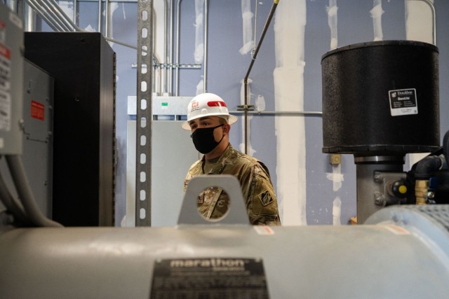 U.S. Army Sgt. Joseph Strupith, 249th Engineer Battalion Charlie Company Prime Power production specialist, assesses a facility’s emergency power generation during Exercise Empire Rising 2021 at the U.S. Naval Academy in Annapolis, Md., July 13,...