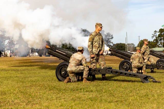 U.S. Army Soldiers assigned to the 3rd Infantry Division fire cannons during the gate dedication ceremony for Capt. Maurice Britt, Capt. Jesse Wooldridge and Cpl. Hiroshi Miyamura on Nov. 18, 2021, on Fort Stewart, Georgia. During Marne Week, the dedication of the installation gates were named to honor the Dogface Soldiers and to inspire others to emulate their example.(U.S. Army photo by Pfc. Elsi Delgado)