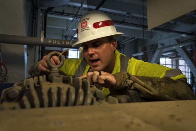 U.S. Army Sgt. Nathan Holmes, 249th Engineer Battalion Charlie Company Prime Power production specialist, relays facility data to fellow soldiers during Exercise Empire Rising 2021 at the Washington Aqueduct in Washington D.C., July 14, 2021. The...