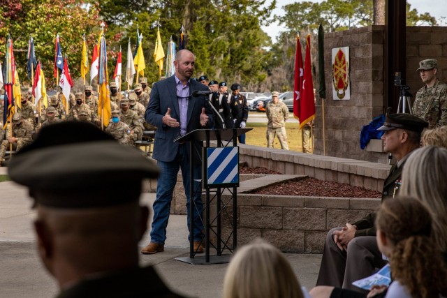 Christopher Britt, grandson of Capt. Maurice Britt, gives a speech to honor his grandfather, Cpt. Maurice Britt, at the gate dedication ceremony as part of Marne Week Nov. 18, 2021, on Fort Stewart, Georgia. During Marne Week, the Division dedicated gate three to honor the Dogface Soldier and Medal of Valor recipient and to inspire others to emulate his example.(U.S. Army photo by Pfc. Elsi Delgado)