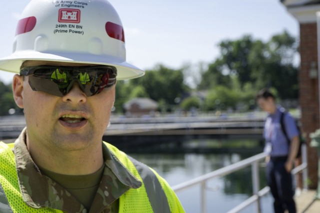 U.S. Army Staff Sgt. Matthew Bradford, 249th Engineer Battalion Charlie Company Prime Power production specialist, stands at the Washington Aqueduct during Exercise Empire Rising 2021 in Washington, D.C., July 14, 2021. During the validation...