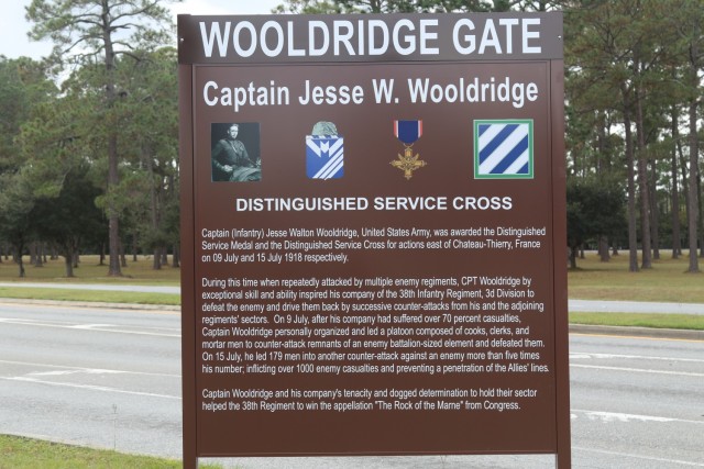Soldiers of 3rd Infantry Division honor the service and bravery of three distinct Dogface Soldiers by renaming three installation gates after them, Fort Stewart, Georgia, Nov 18, 2021. During the dedication ceremony, gates 1, 3 and 5 were named after the Distinguished Service Cross recipient Capt. Jesse Wooldridge, Medal of Honor Recipient Capt. Maurice Lee “Footsie” Britt and Medal of Honor Recipient Cpl. Hiroshi H. “Hershey” Miyamura, respectively.