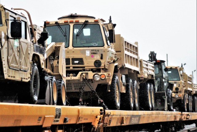 Equipment belonging to the Wisconsin Army National Guard’s 829th Engineer Company (Vertical Construction) is shown on railcars waiting to be unloaded as part of redeployment rail operations Oct. 22, 2020 at Fort McCoy, Wis. The offload included...