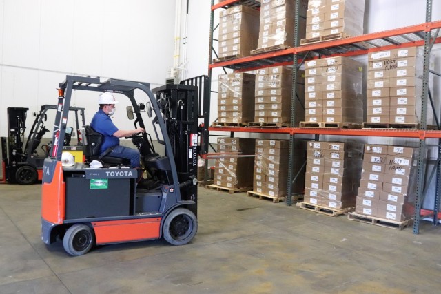 Heavy equipment and forklift operator Davey Stutts with Taylors International Services Inc. assists in moving food pallets Oct. 14, 2021, while supporting the Fort McCoy Logistics Readiness Center (LRC) Food Program Management Office and LRC...