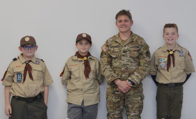 VICENZA, Italy - U.S. Army Garrison Italy Commander Col. Matthew Gomlak poses for a picture with (from left to right) 10-year-old Charlie Cooper, Brian Ehler, 10, and Fletcher Williams, 11 at the Spiritual Life Center on Caserma Ederle Nov. 4, 2021. At the meeting, the children asked Col. Gomlak several questions while focusing on their first adventure ‘Building a Better World’, during their preparation to earn the “Arrow of Light”, the highest badge in Cub Scouting.

They will also complete three adventures including Duty to God in Action; Outdoor Adventurer; Scouting Adventure, and at least one elective adventure out of 18 possible ones.