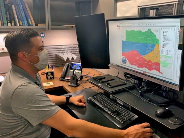 Geospatial Data Manager Wesley Street puts the finishing touches on the latest Tulsa District boundary map.  This map will be utilized by district employees as well as the public.