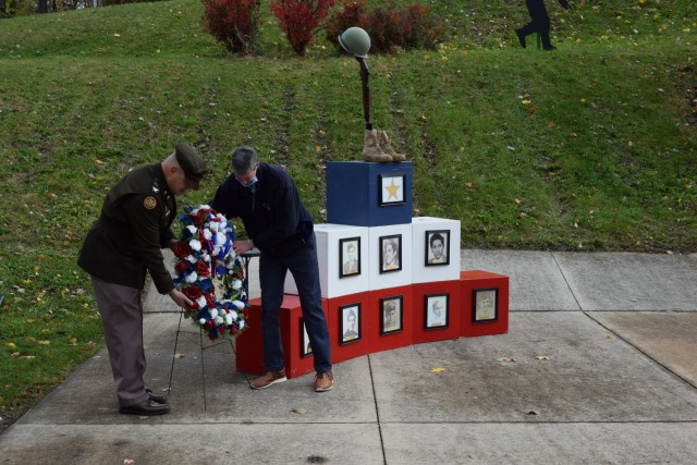Col. Todd Allison, garrison commander, US Army Garrison Rock Island Arsenal, and Matt Carter, mayor, Silvis, Illinois, lay the ceremonial wreath during the Hero Street Memorial Park Veterans Day Ceremony in Silvis, held Nov. 11.