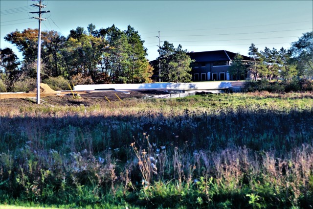 The area of construction operations is shown at a bridge area on South J Street on Oct. 18, 2021, where a new bridge was built on the street at Fort McCoy, Wis. The new bridge was built over Tarr Creek on the installation’s cantonment area. Fort...