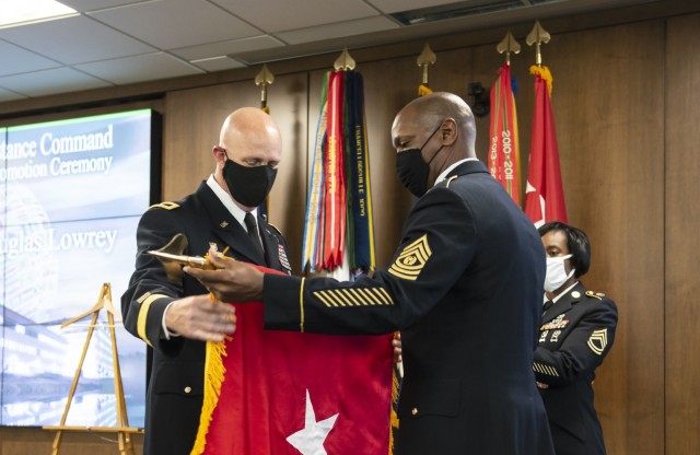 Brig. Gen. Douglas Lowrey, left, and Command Sgt. Maj. Sean Rice, right, unfurl the one-star flag during Lowrey&#39;s promotion ceremony at the U.S. Army Security Assistance Command headquarters, Redstone Arsenal, Ala., on Sept. 18, 2020. 

Lowrey, the only Native American general officer currently in the Army, shared his story of discovering his Cherokee heritage during a Facebook Live broadcast on Nov. 17, 2021. 
