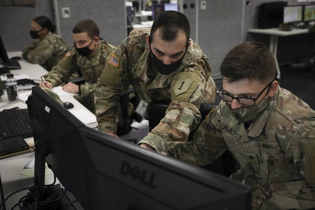 Soldiers of the 2nd Armored Brigade Combat Team, 1st Infantry Division, conduct a simulated reconnaissance mission during Dagger Crucible III on November 3, 2021 at Fort Riley, Kansas. Dagger Crucible III ensures the combat readiness of the Dagger Brigade while also focusing on warfighting mastery.