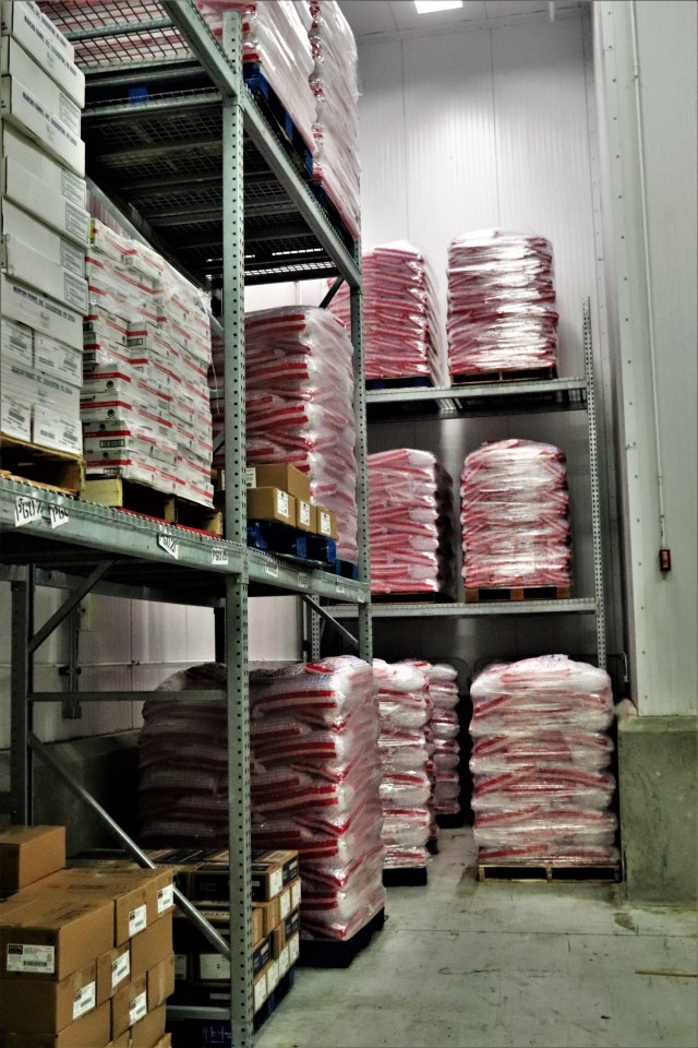 Stored food items are shown Oct. 14, 2021, at the warehouse for the Fort McCoy Logistics Readiness Center Food Program Management Office and Supply Subsistence Management Office in building 490 at Fort McCoy, Wis. The installation’s food-service...