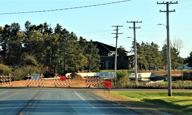 The area of construction operations is shown at a bridge area on South J Street on Oct. 18, 2021, where a new bridge was built on the street at Fort McCoy, Wis. The new bridge was built over Tarr Creek on the installation’s cantonment area. Fort...