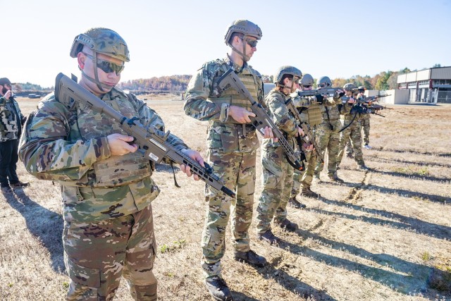 Civilian employees from the U.S. Army Combat Capabilities Development Command Soldier Center receive basic marksmanship instruction on airsoft guns in the field during Greening training held November 1-5, 2021 at Fort Devens, Massachusetts.
