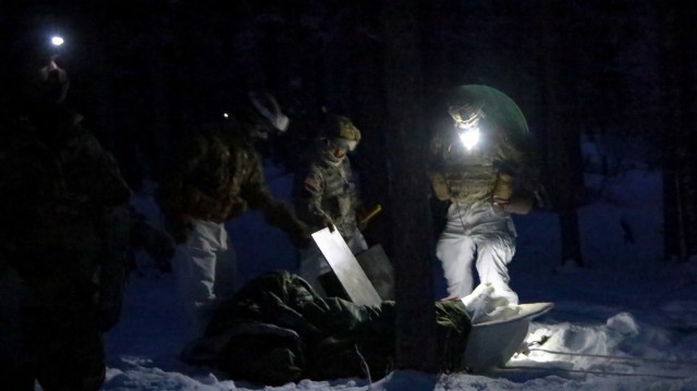 Senior leaders from US Army Alaska start putting up their tent, in negative 20 degree weather, for the night as they get ready to sleep at Black Rapids Training Site Nov 17 as a part of their Cold Weather Orientation Course. Black Rapids runs a “Train the Trainer” course and Cold Weather Orientation Course, for senior leaders, to provide units in USARAK with leaders that then go back to their units and train Soldiers in how to survive in the Arctic environment. (Photos provided by Staff Sgt. Christopher B. Dennis/USARAK Public Affairs NCO)