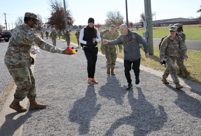 Soldiers, civilians and families of 83rd ARRTC deliver fun, food at 3rd annual holiday ruck march