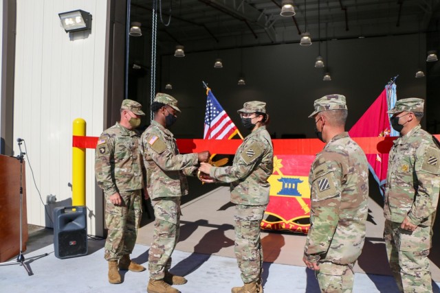 Soldiers assigned to the "Maintain Battalion," 703rd Brigade Support Battalion, 2nd Armor Brigade Combat Team, 3rd Infantry Division, cut the ribbon during the opening ceremony of 2ABCT's new supply support activity facility at Fort Stewart, Georgia, Nov. 9, 2021. The new SSA facility brings to bear modernized systems and processes to provide all items necessary to equip, maintain and sustain 2nd ABCT's modernization and supports the Division's glide path to become the most modernized division in the U.S. Army by summer of 2023. (U.S. Army photo by Sgt. Trenton Lowery)