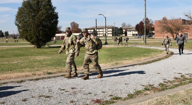 Soldiers, civilians and families of 83rd ARRTC deliver fun, food at 3rd annual holiday ruck march